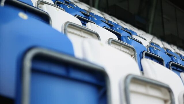 a football stadium. empty stands at the stadium. free seats on the podium. an empty stadium