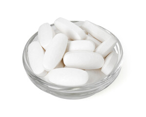 Vitamin pills in bowl isolated on white. Health supplement