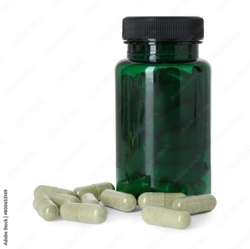 Sticker bottle and pile of vitamin pills isolated on white