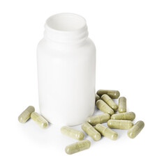 Bottle and pile of vitamin pills isolated on white