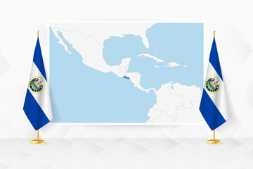 Map of El Salvador and flags of El Salvador on flag stand.
