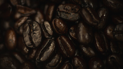Close-up macro shot of French roasted coffee beans.