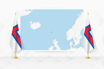 Map of Faroe Islands and flags of Faroe Islands on flag stand.