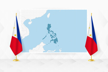 Map of Philippines and flags of Philippines on flag stand.