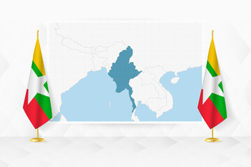 Map of Myanmar and flags of Myanmar on flag stand.