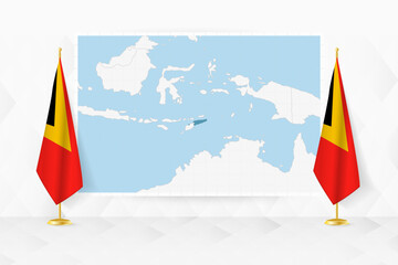 Map of East Timor and flags of East Timor on flag stand.