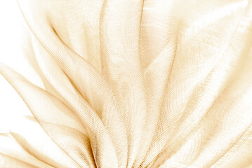closeup of the wavy creamy peach color  organza fabric