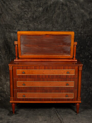 wooden vintage furniture on gray background