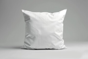 Obraz premium A white pillow resting on a table, suitable for home decor