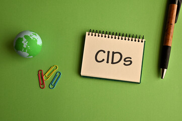There is notebook with the word CIDs. It is an abbreviation for Climatic impact-drivers as eye-catching image.