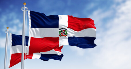Detail of the national flag of the Dominican Republic waving in the wind on a clear day