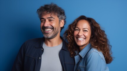 Fototapeta premium Joyful Mature Couple in Blue Tones. Generative AI.
