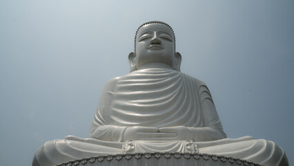 Giant white stone buddha statue