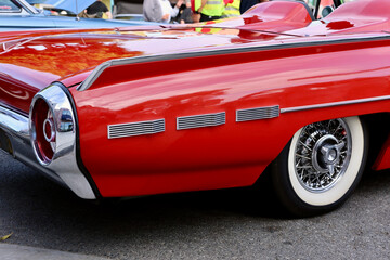 sideview of a classic red sports car
