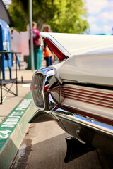 closeup detail of the classic car tail fin and taillights