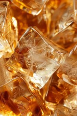 A close up of many ice cubes inside a cold brown or orange or yellow drink maybe alcohol whiskey or iced coffee or orange juice. reddish liquid texture.