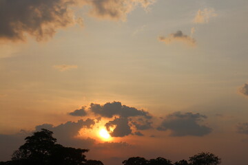 Beautiful colorful dramatic sky with clouds at sunset or sunrise.