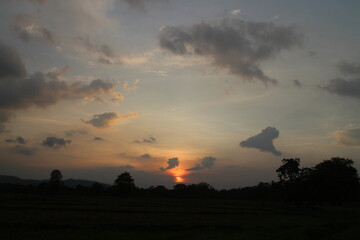 The sky ablaze with hues of orange and pink as the sun gently sank below the horizon making the end of another beautiful day.