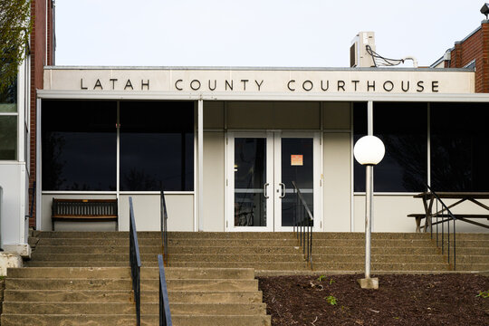 Moscow, ID, USA - April 27, 2024; Steps and entrance to Latah County Courthouse with sign in Moscow Idaho