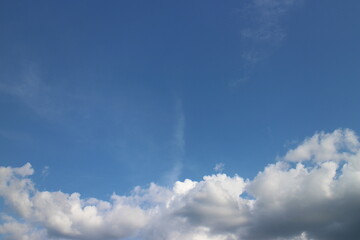 Blue sky with white clouds.