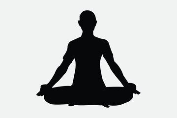 silhouette of a person in yoga position