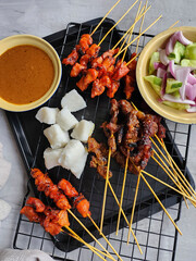 Asian street food. Beef, Lamb and Chicken Satay with Peanut Chilli Gravy Sauce. Popular and liked...