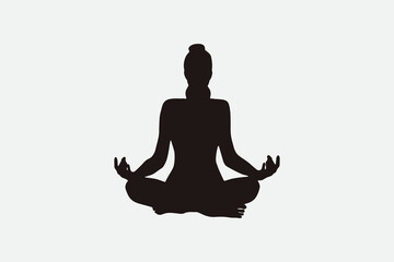 silhouette of a person in yoga position