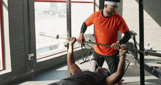 Bench, weights and man exercise with help, funny and fail for gym workout with personal trainer. Support, weak or bodybuilder for strength and muscle, fitness or barbell for chest at health centre