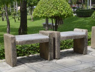 Fototapeta premium bench and stone in city park