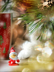 Cup of coffee or hot chocolate. Christmas tree and decorations toys, Cozy home. Christmas atmospheric mood. Happy New Year