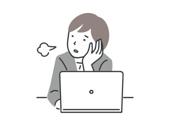 デスクワーク中にため息をつくスーツを着た女性