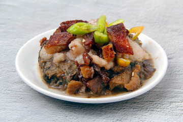 Freshly cooked Filipino dish called Laing with Lechon