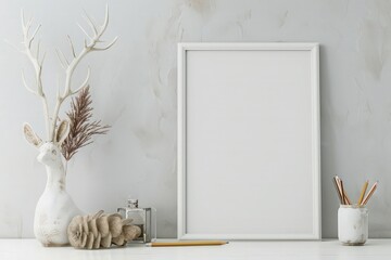 White frame mock up with pencil and decor deer. Modern stylish interior background for social media and marketing.