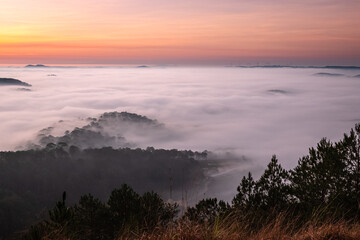 The sunrise with beautiful colors at highland in Da Lat, Viet Nam. Sunrise with fog in early morning.