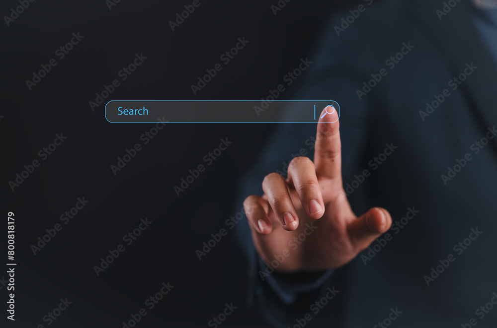 Leinwandbilder man hand touching on search bar for search engine optimization or seo concept to find information or