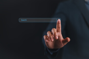 man hand touching on search bar for Search Engine Optimization or SEO concept to find information...