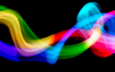 Abstract colorful irregular lines background. Long exposure. Light painting photography.