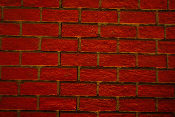 Close-Up Front View of Wall Covered with Matte Red Blocks. Abstract Design with Square Shapes....