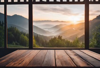 Sunrise over misty mountains viewed from a wooden terrace, showcasing a serene and picturesque landscape.