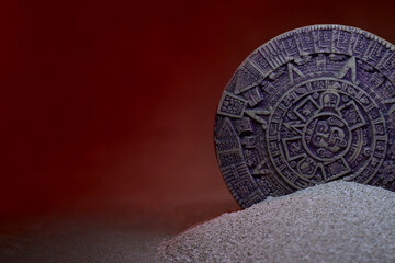 Fifth Sun artifact with red background