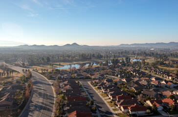 Daytime aerial view from hot air balloon of housing in Winchester southern California United States