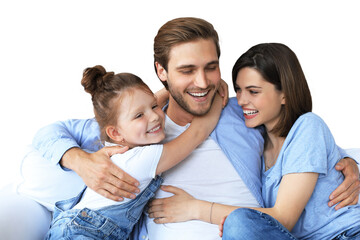 Positive friendly young parents with smiling little daughter sitting on sofa together while...