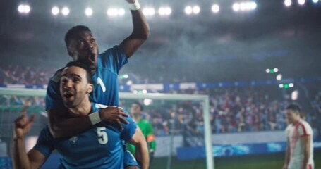 Portrait of a Handsome Multiethnic Soccer Player Celebrating After Scoring a Goal. Hispanic and African Players Hugging Each Other, Excited to Win the Championship Cup Game