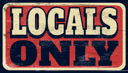 Aged and worn retro locals only sign on wood