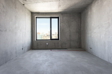 interior of the apartment without decoration in gray colors. rough finish
