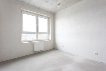 interior of the apartment without decoration in gray colors. rough finish