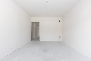 interior of the apartment without decoration in gray colors. rough finish