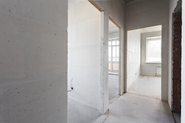 interior of the apartment without decoration in gray colors. rough finish