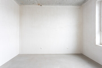interior of the apartment without decoration in gray colors. rough finish