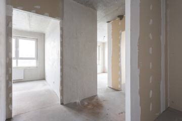 interior of the apartment without decoration in gray colors. rough finish